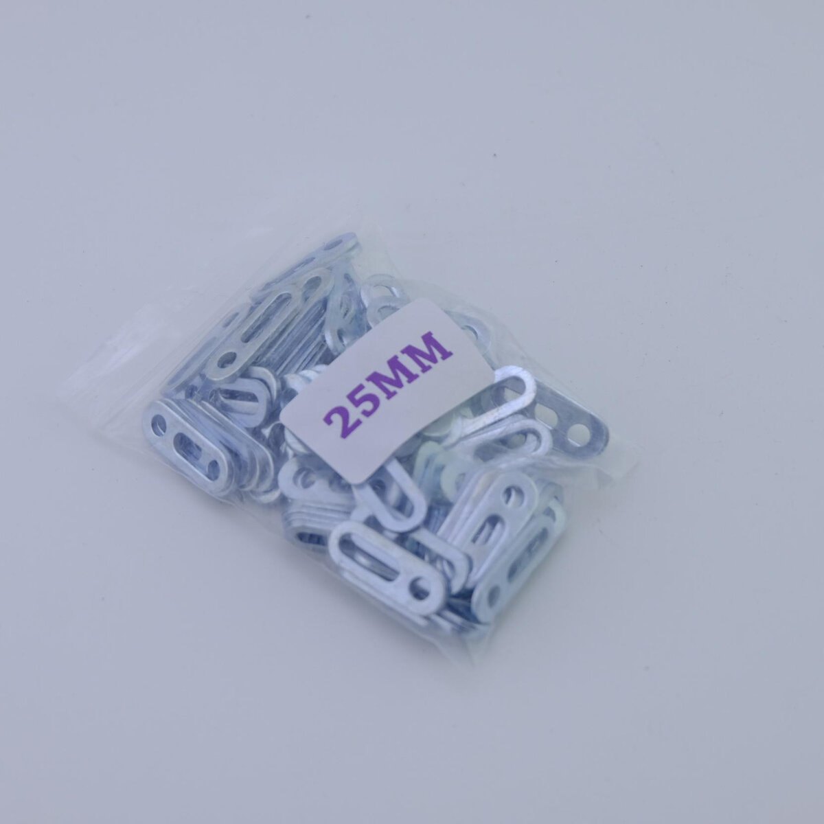 แผ่นเหล็ก รูอเนกประสงค์ 25MM (100ตัว/ห่อ)